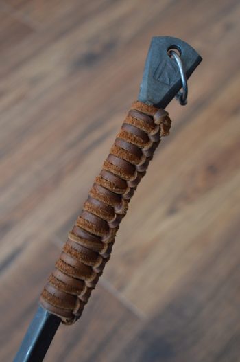 Details of the fire poker's leather handle