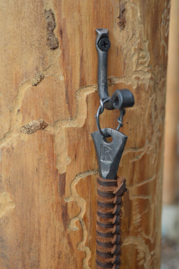 Fire Poker on Wall Hook Reforged Ironworks Canadian Blacksmith